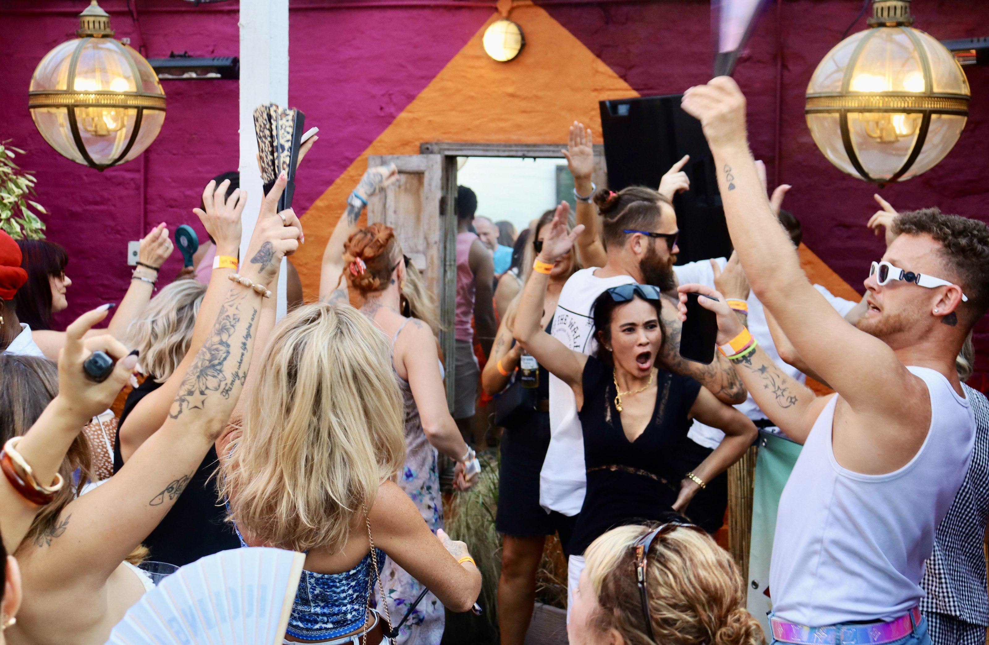 Guests dancing in the courtyard at The Loopy Shrew, Shrewsbury.